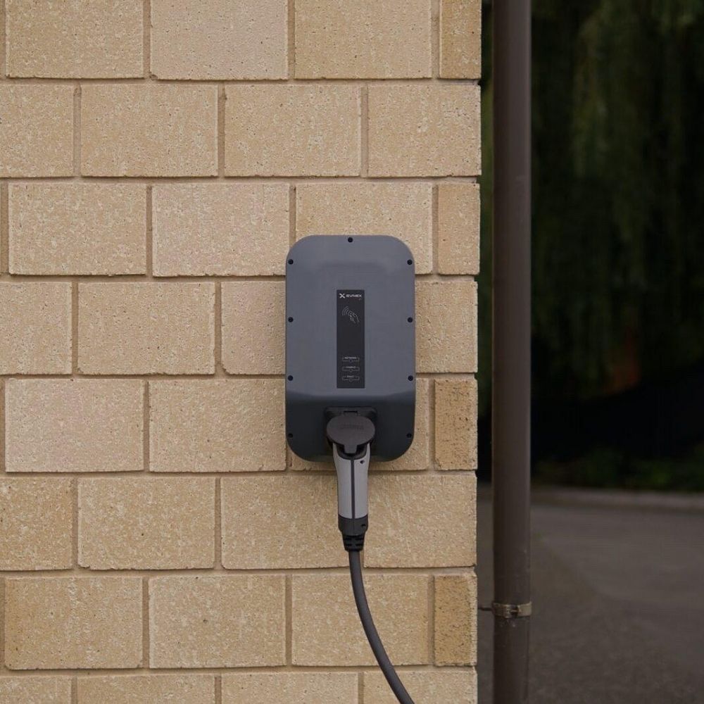Home EV charger installed on brick wall in St Albans driveway